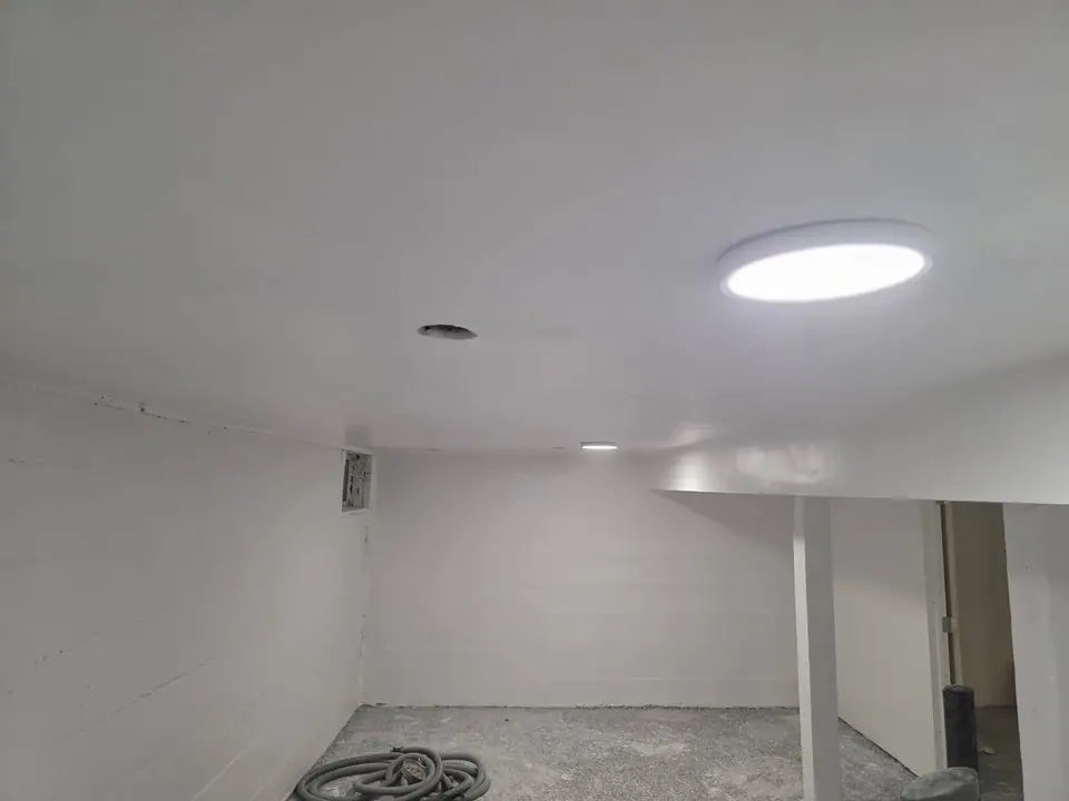 Basement ceiling: ductwork boxed in, bulkheads and drywall, photo 9 of 9 (in progress)