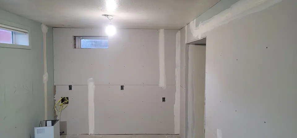 Basement suite: demolition, plumbing and drywall, photo 22 of 29 (in progress)