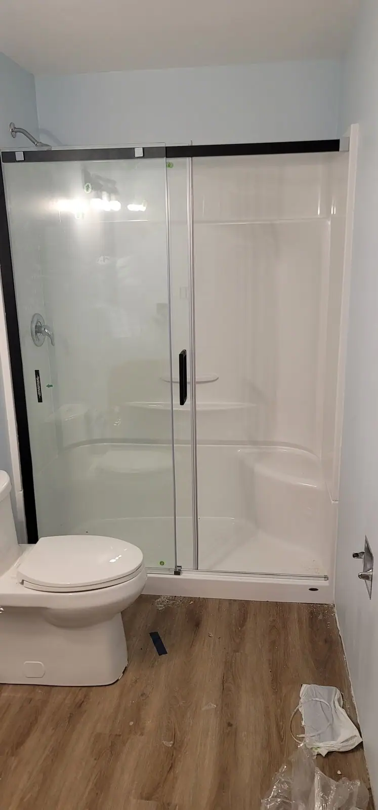 Bathroom with a full-width sliding glass shower, photo 4 of 5 (finished)