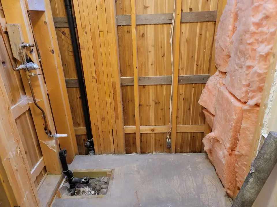 Bathroom rebuild with a skylight well and wood vanity, photo 4 of 11 (demolition)