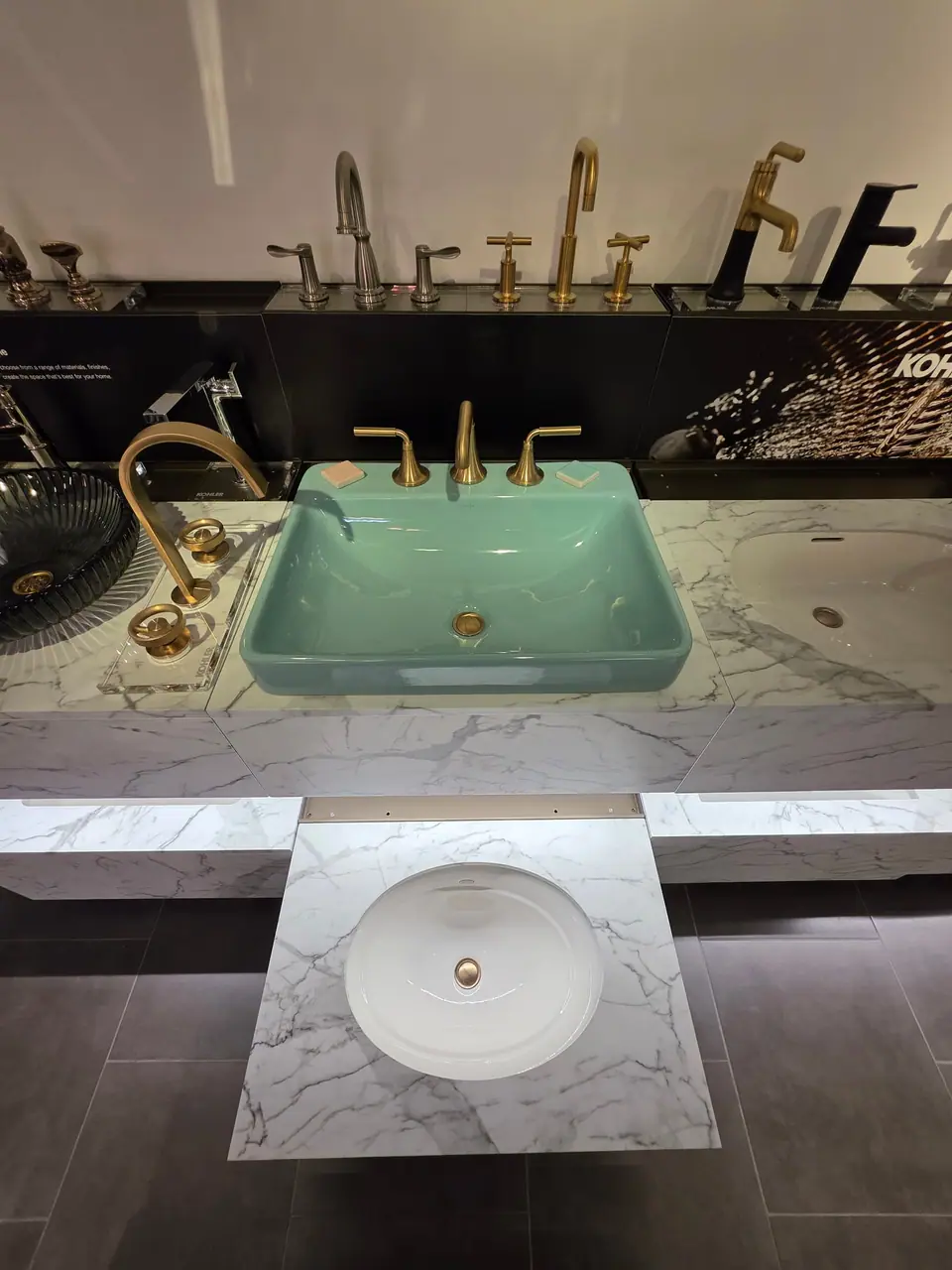 Bathroom sinks, faucets and vanities in a KOHLER fixture showroom