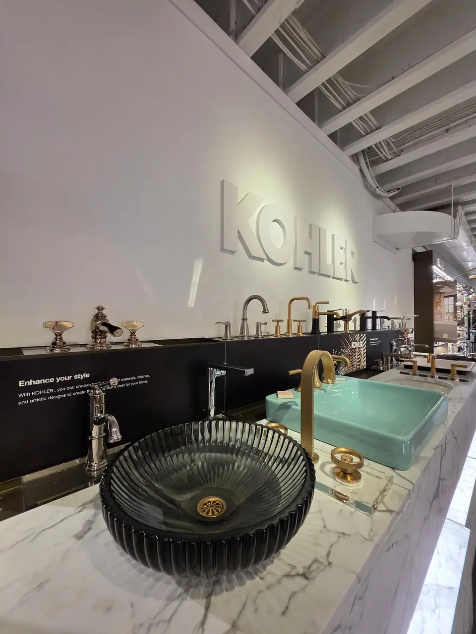Bathroom sinks, faucets and vanities in a KOHLER fixture showroom