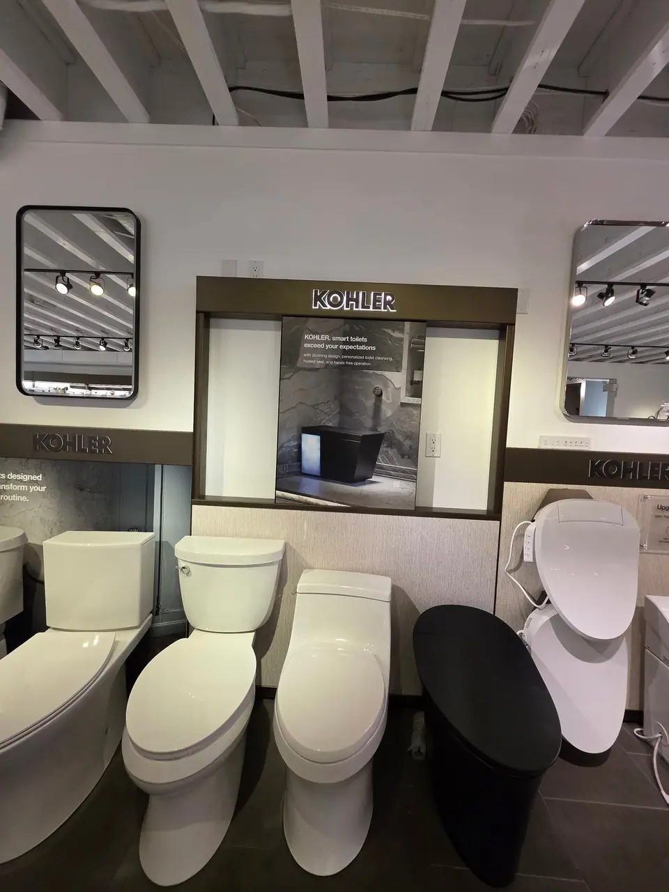 Toilets and bidet seats in a KOHLER fixture showroom